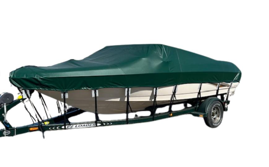 Green Shoretex custom boat cover on trailered boat