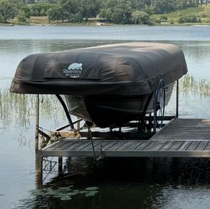 Black Shoretex canopy on pontoon boat lift